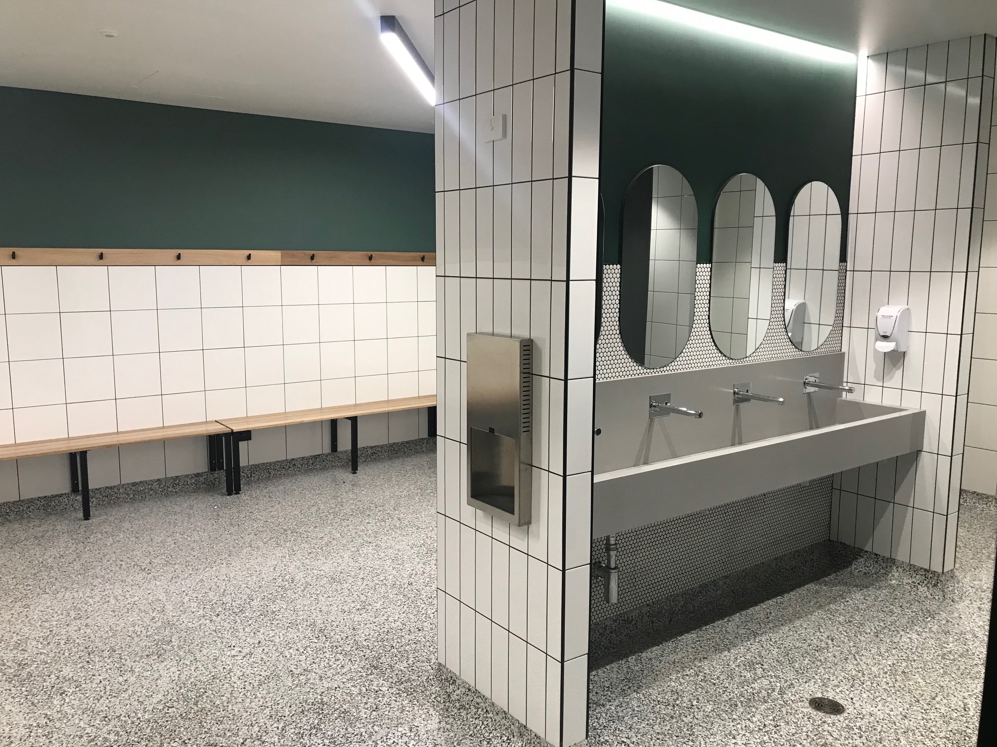 Completed epoxy flake flooring — Cabra Dominican College gymnasium changerooms