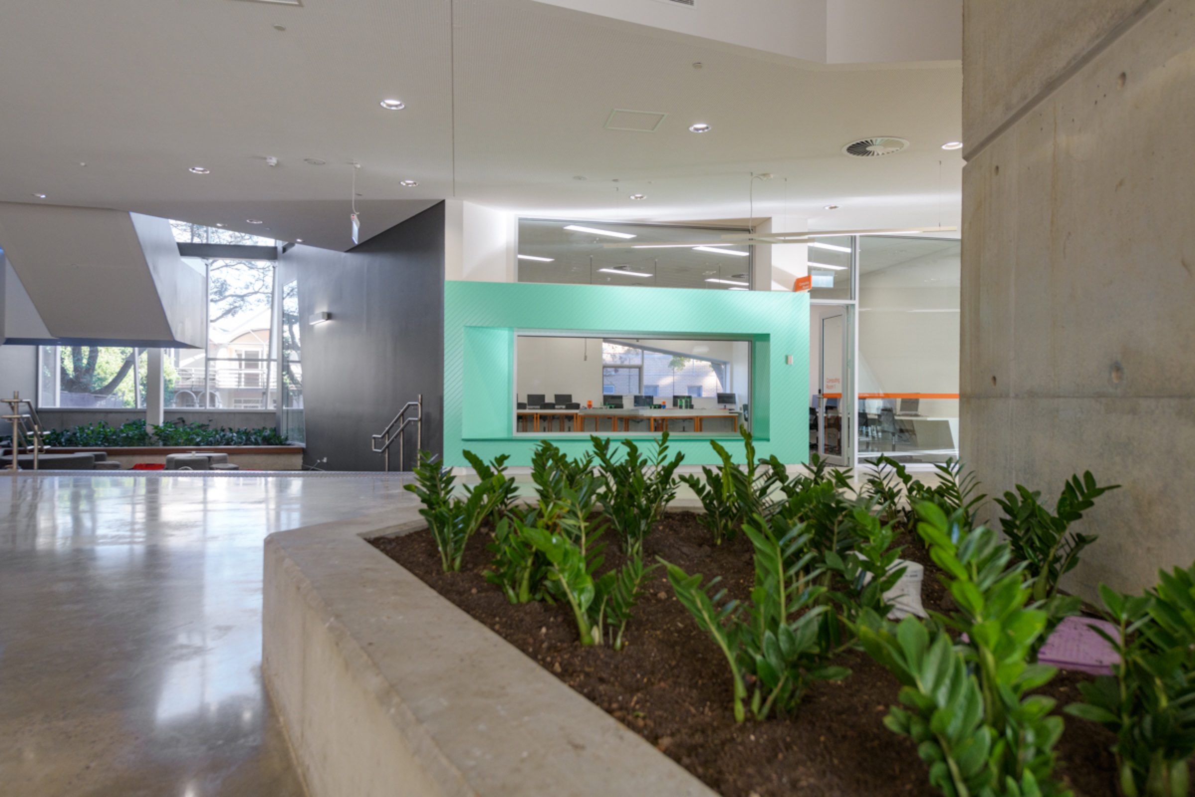 High-traffic corridor polished concrete flooring — Pembroke School
