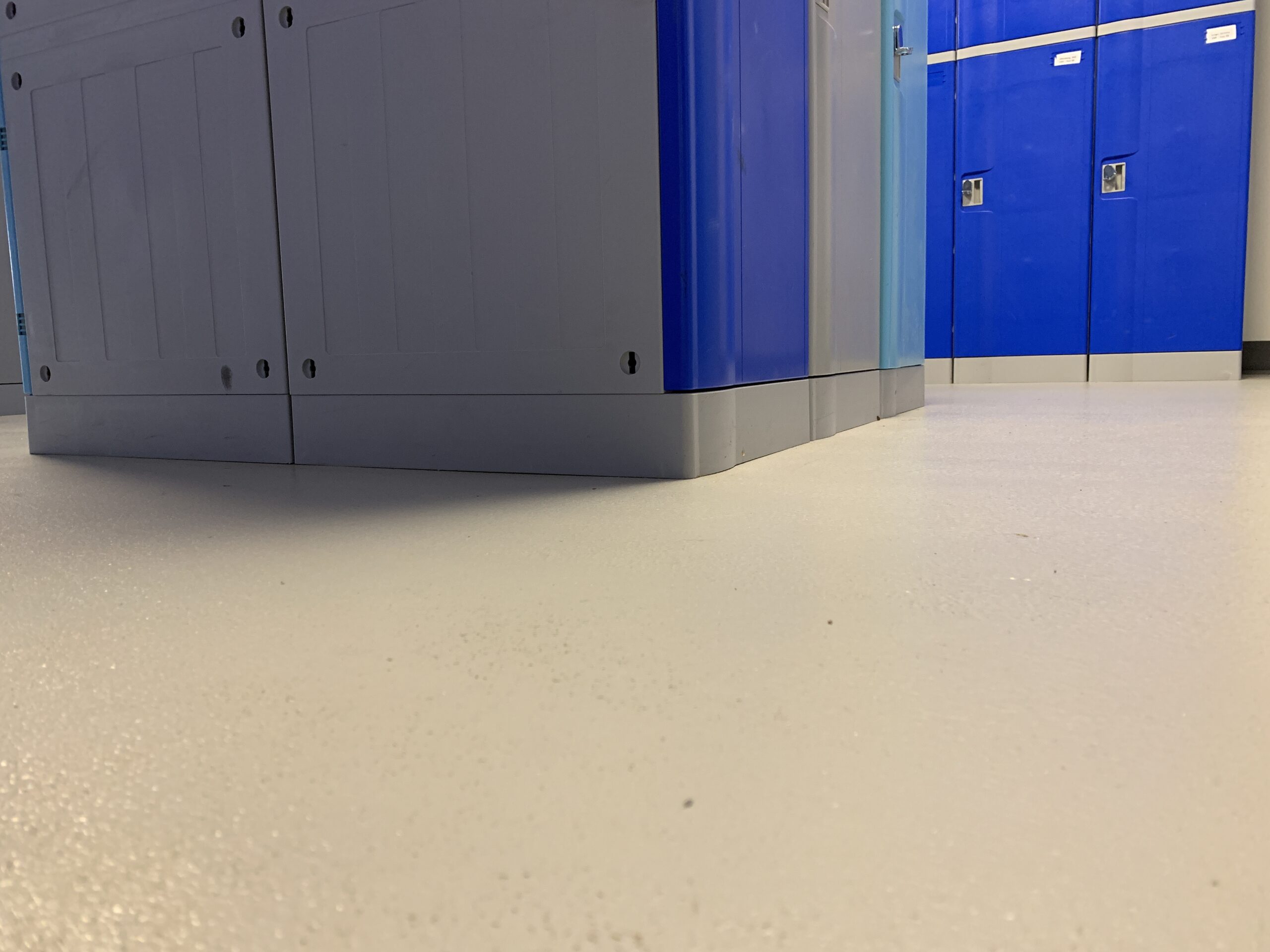 Epoxy non-slip floor coating close-up — Faith Lutheran College student locker bay
