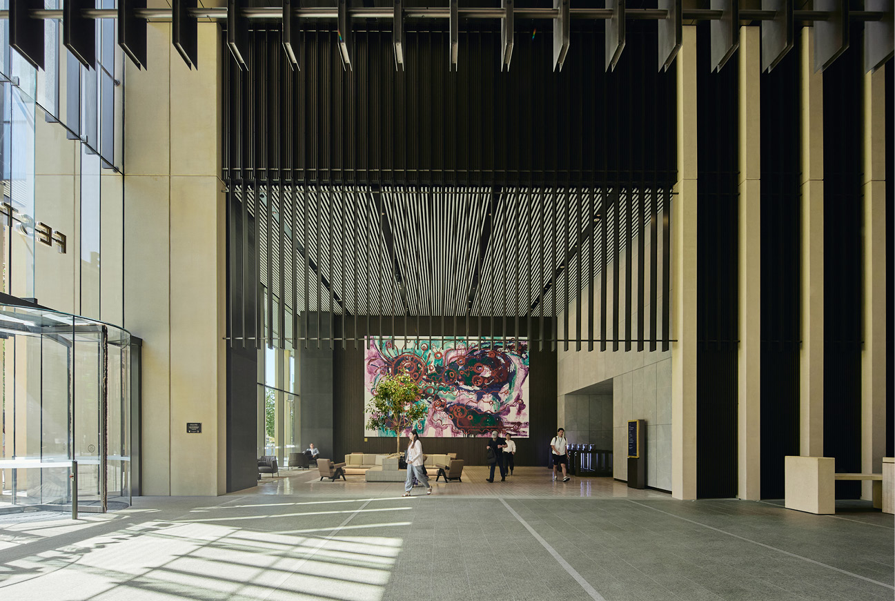 Festival Tower lobby — wide view of polished stone floor with natural light