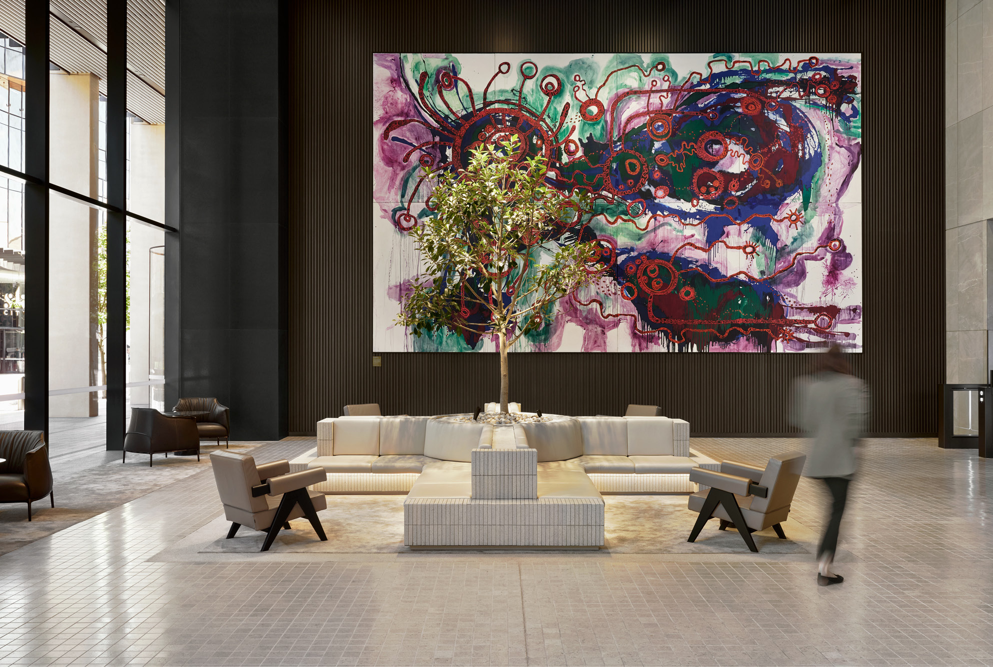 Festival Tower lobby seating — polished floor finish under Indigenous artwork