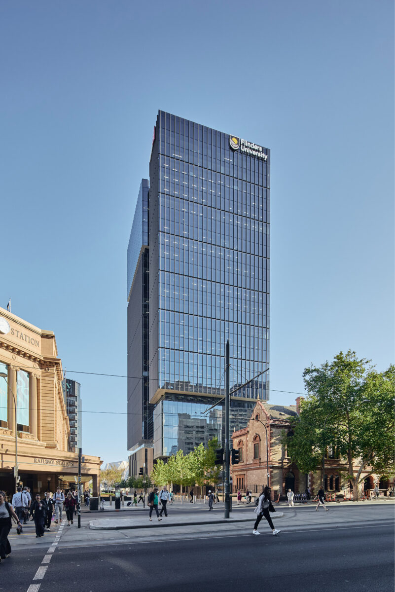 Festival Tower Adelaide rising above the historic Adelaide Railway Station